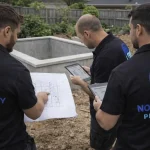 The 3 North Sydney Plunge Pools Team are reviewing the plan while on the site.
