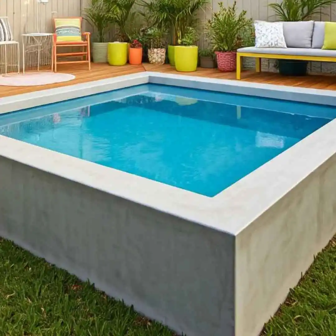 Above-ground concrete plunge pool with timber deck, outdoor seating, and potted plants in a stylish backyard in Mosman, NSW.