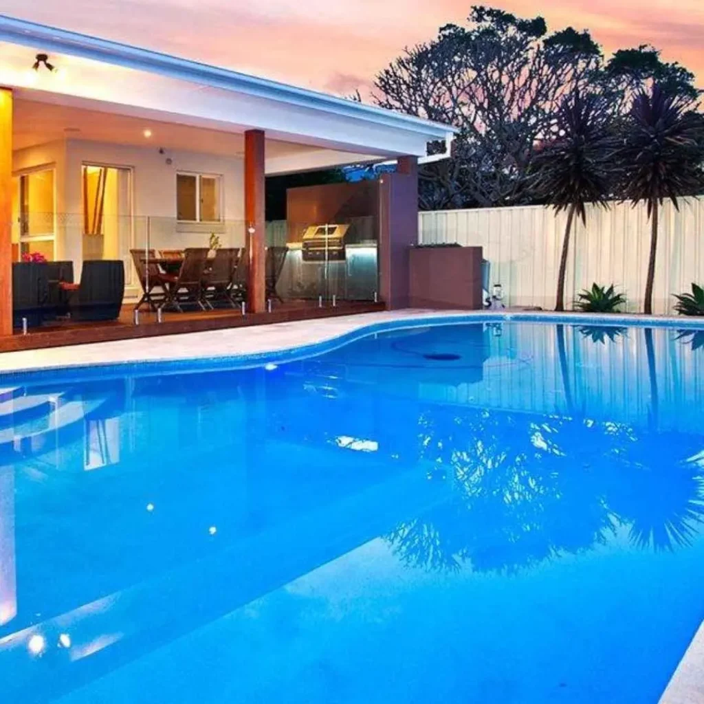 Custom backyard swimming pool with covered alfresco dining area in Cremorne NSW